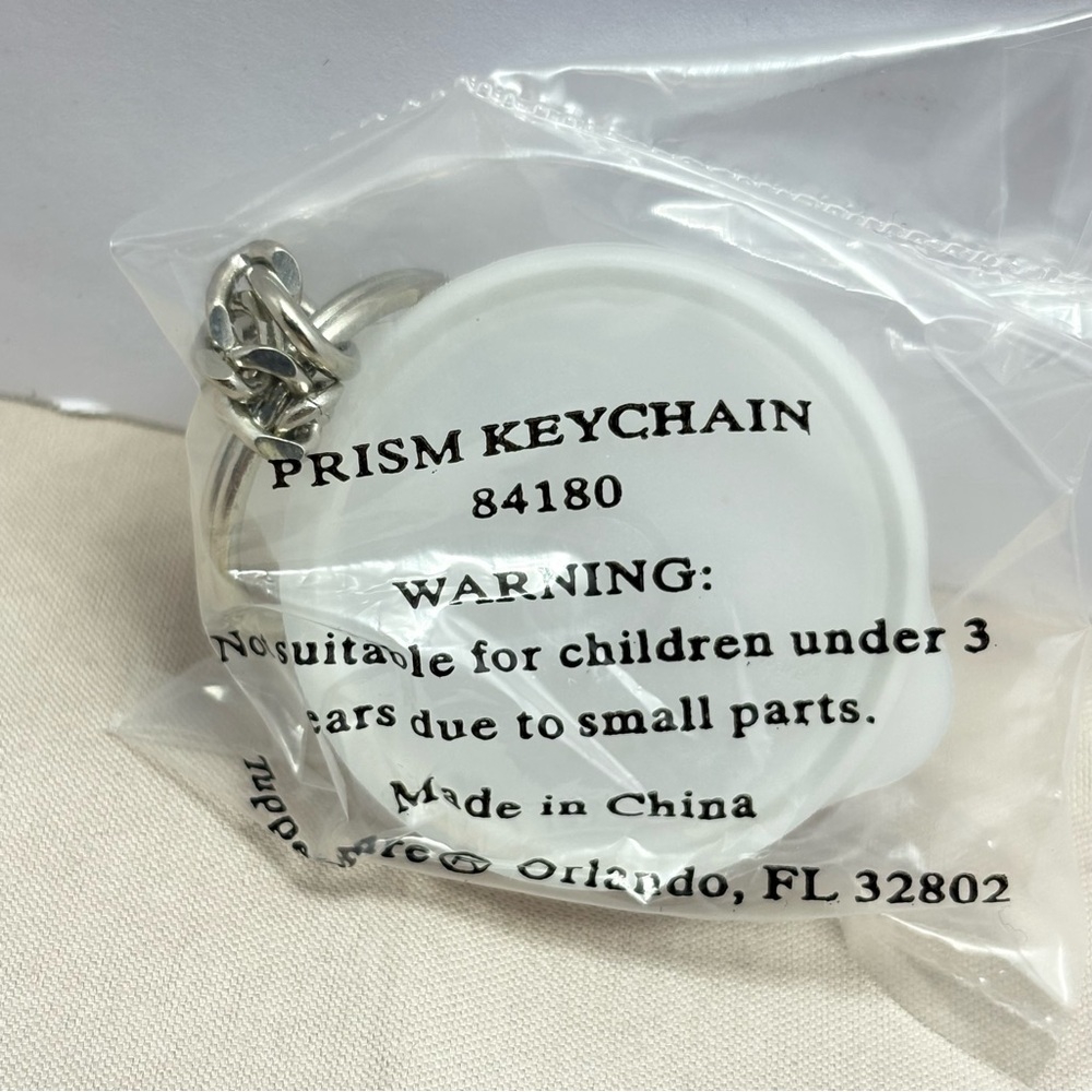 Tupperware White clear Prism bowl collectible Keychain.